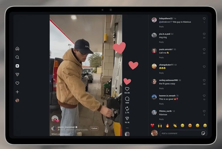 Tablet Android exibindo interface do Instagram otimizada para tablets, com vídeo em reprodução e coluna de comentários e interações na lateral direita da tela.